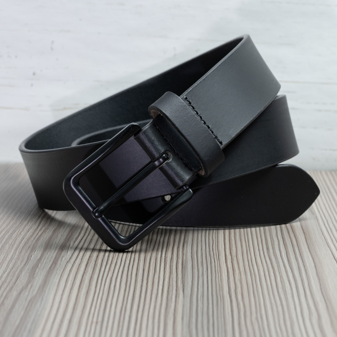 Black Mountain Leather Belt coiled. Black-on-black style.
