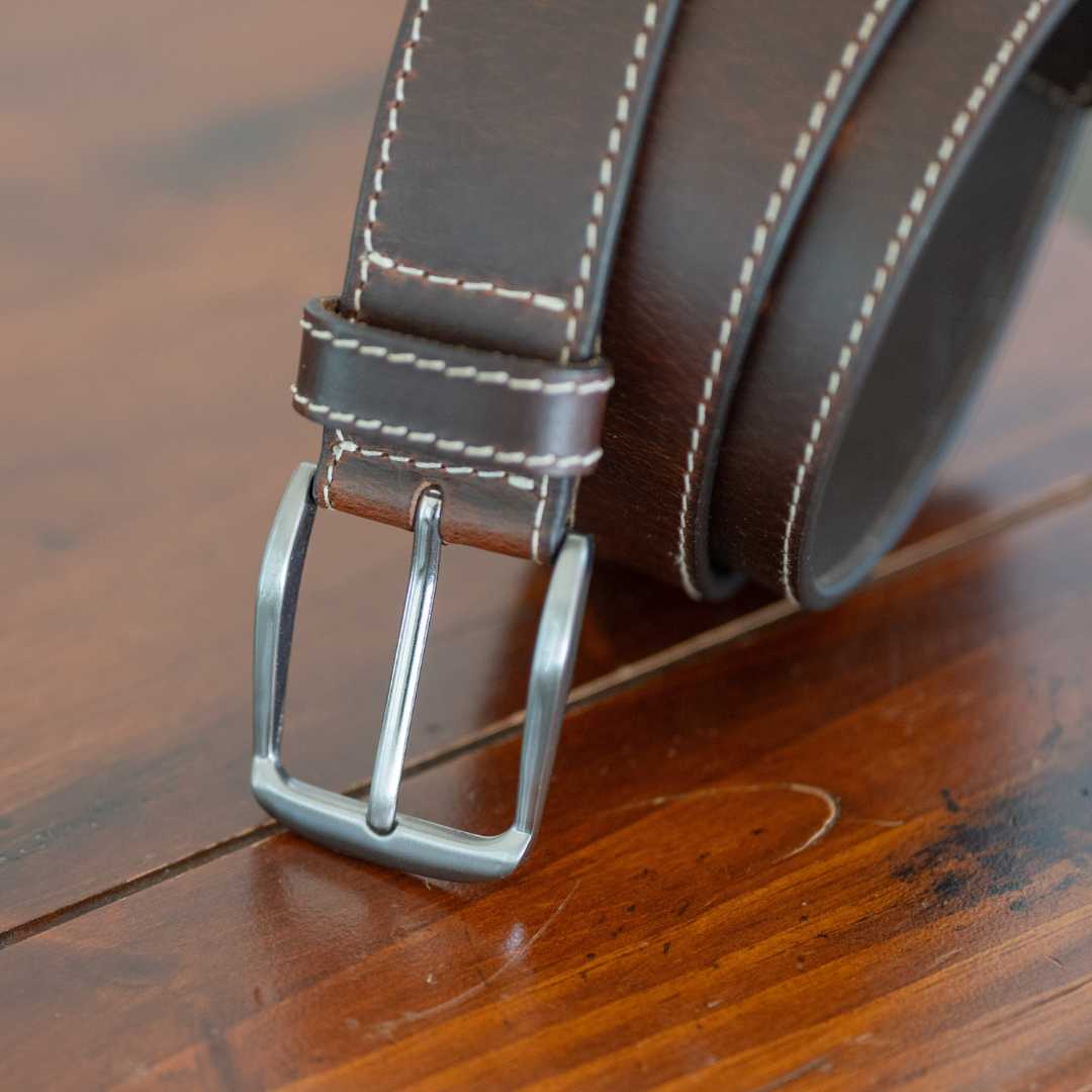 Brown Leather Belt with cream colored stitching on either edge. 1.5 inch Nickel Free Buckle