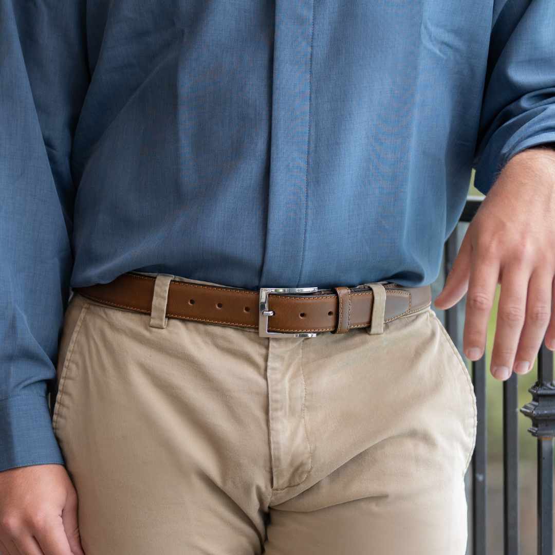 Image of Uptown Tan Dress Belt on model. Hypoallergenic, stitched edges, professional