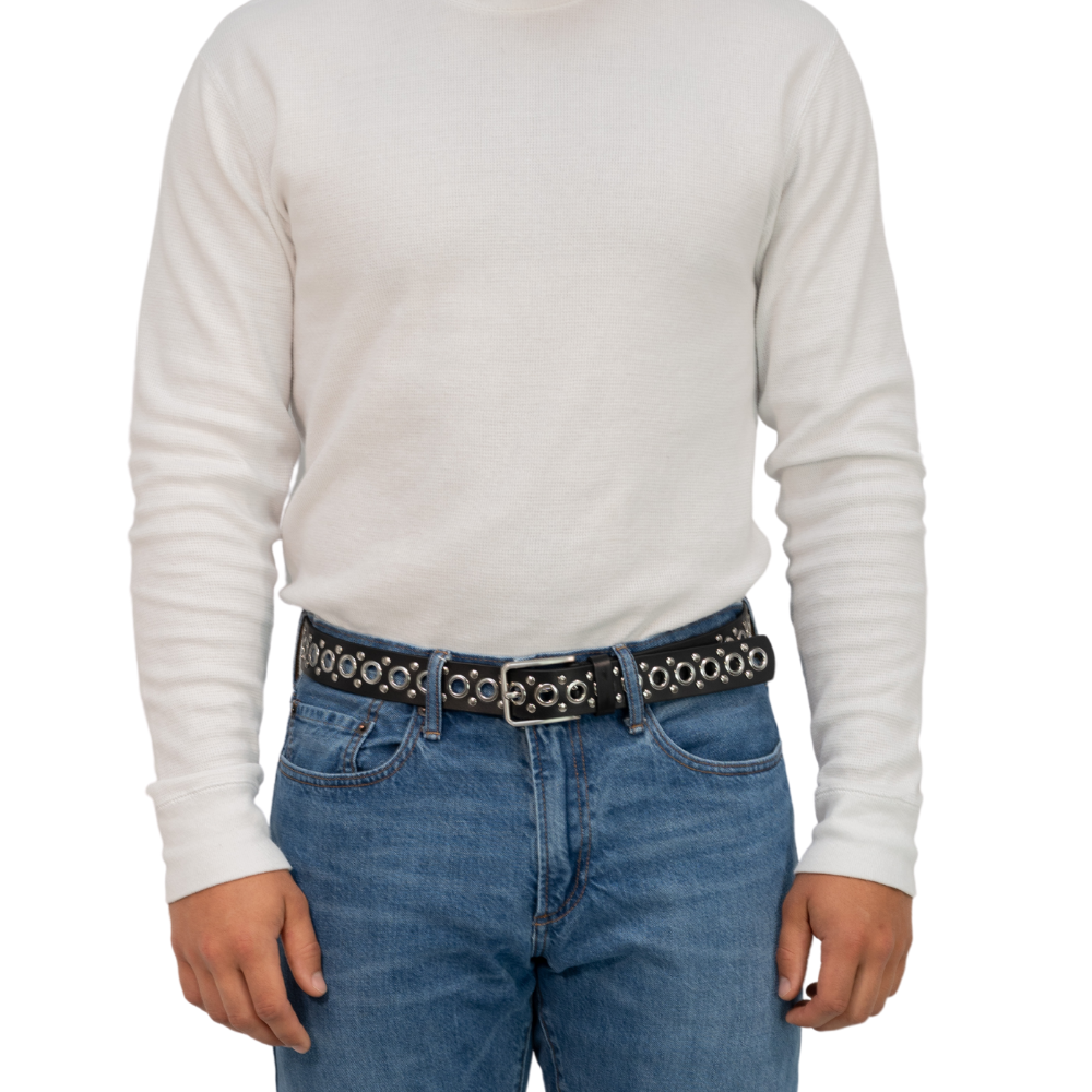Black Studded Belt V.3 on model in jeans. Full grain black leather strap, silver grommets and studs.