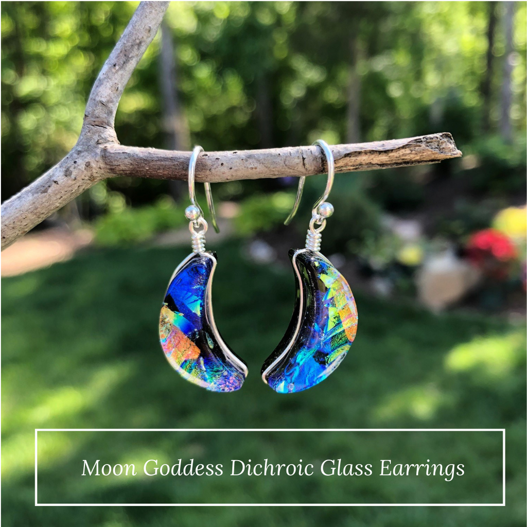 Moon Goddess Dichroic Glass Earrings. Outdoor setting. One of a kind hand-fired dichroic glass.