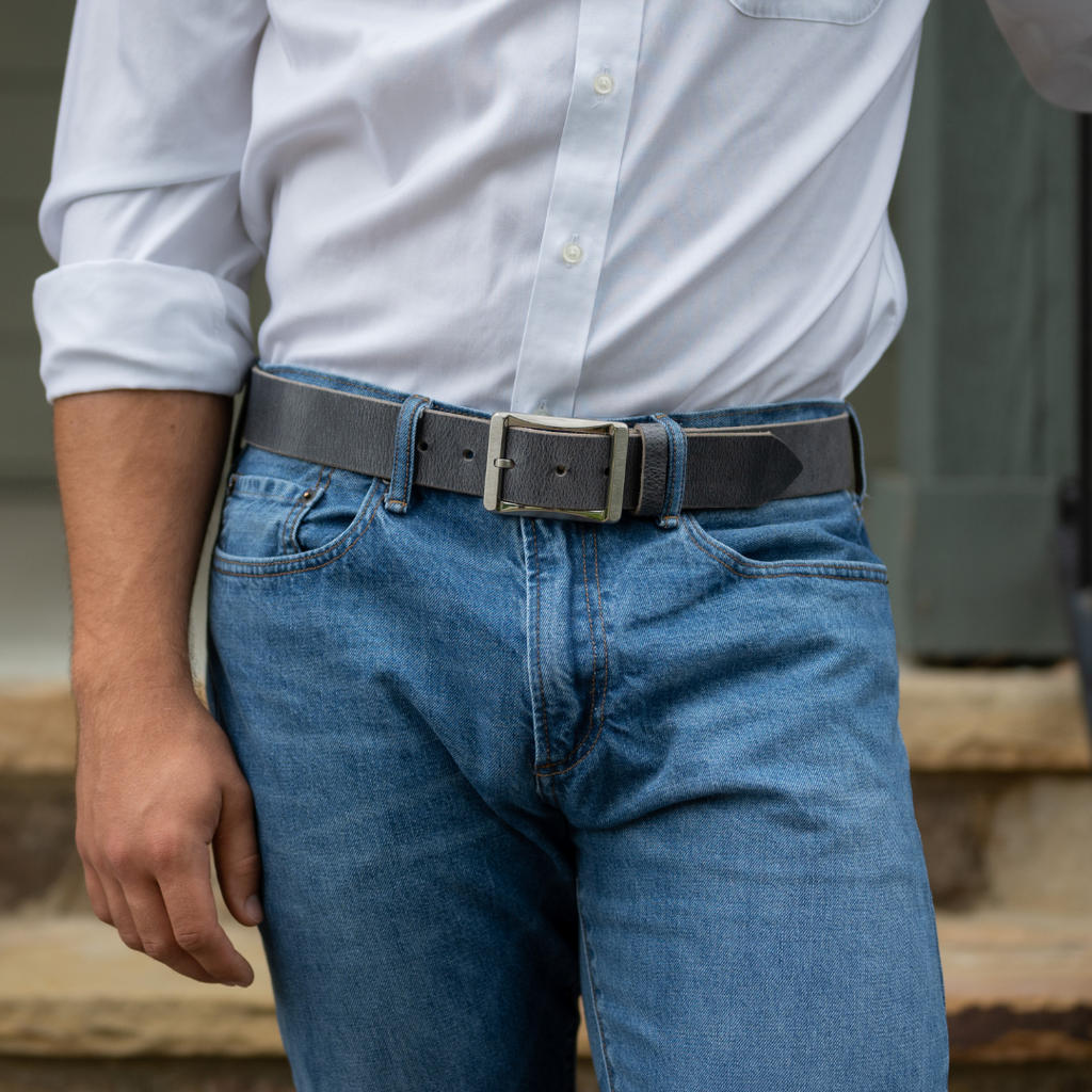 Titanium Work Belt (Distressed Gray) on model in jeans. 1.5 inch full grain leather strap.