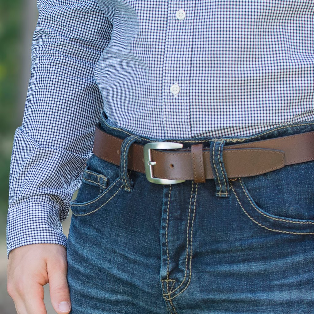Casual Brown Belt II on model in jeans. Casual style. Silver-tone buckle with dark brown strap.