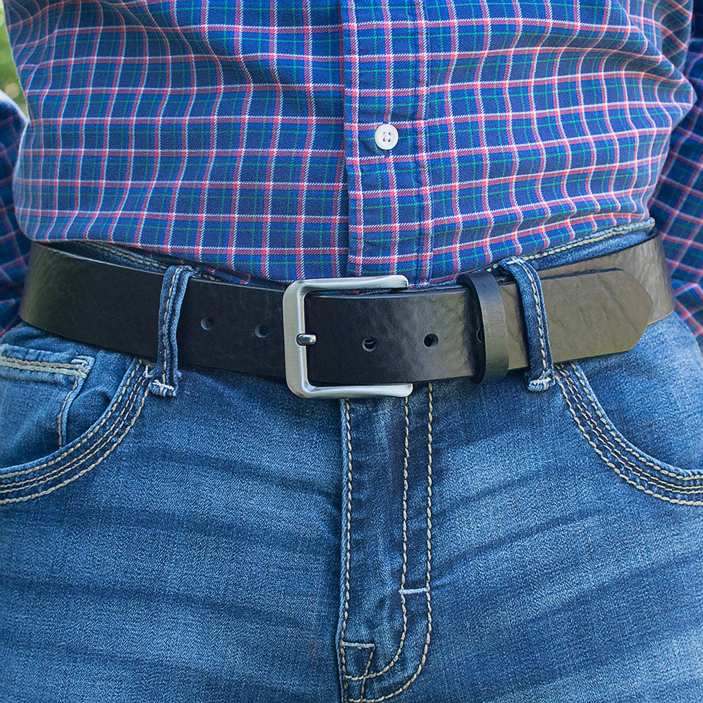 New River Black Belt on model. Casual belt, great jeans belt. Lightly rippled texture on the strap.