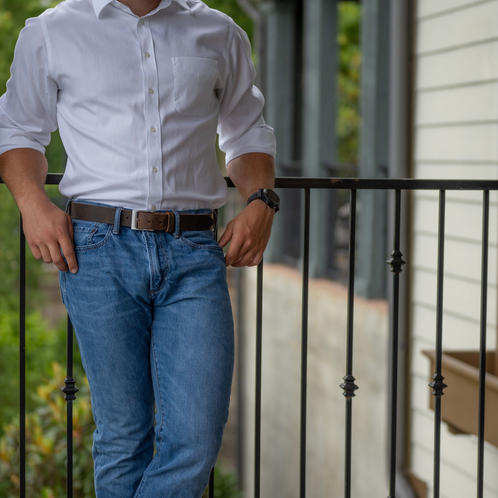 Caraway Mountain Distressed Brown Leather Belt on model in jeans. Casual belt with raw edges.