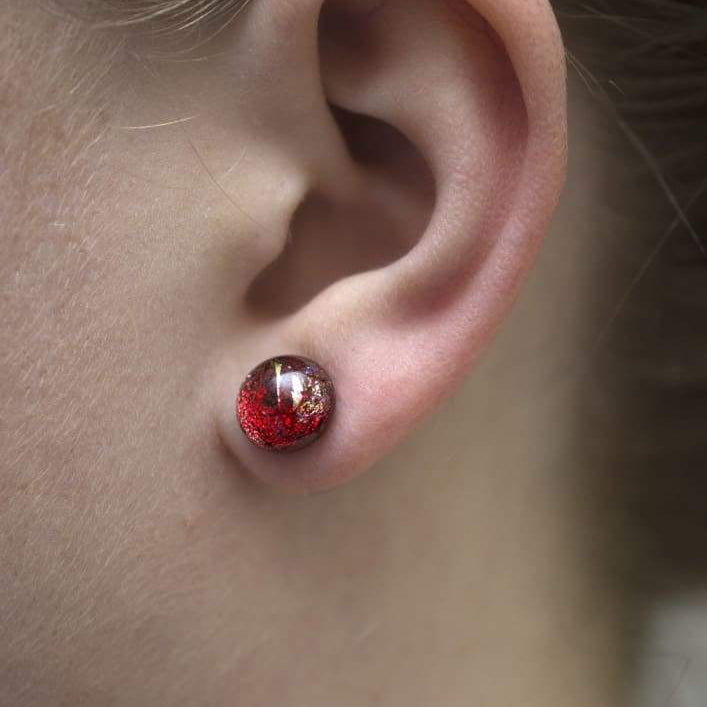 Interstellar Earrings on model. No rash! Small circular earrings are 4-6mm, smaller than earlobe.