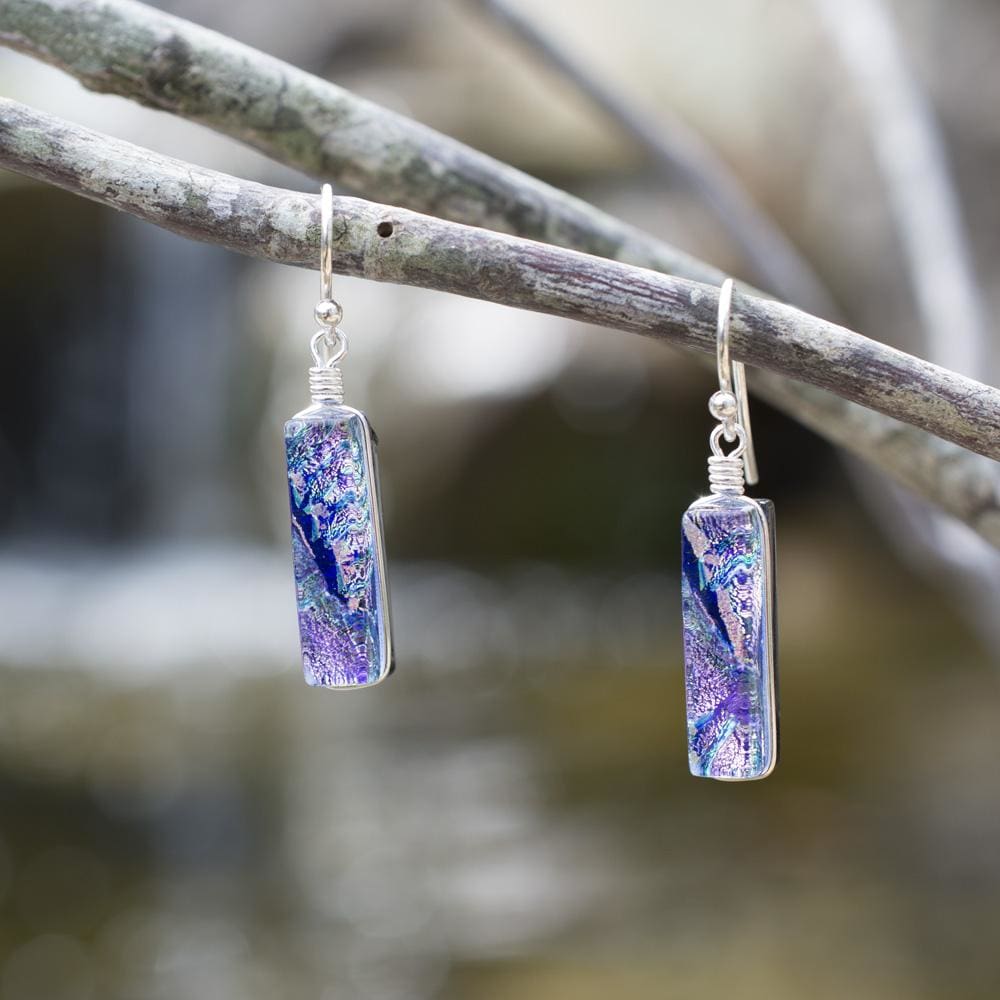 Looking Glass Falls Earrings - Lilac. Outdoor settings. Each pair's dichroic glass color varies.