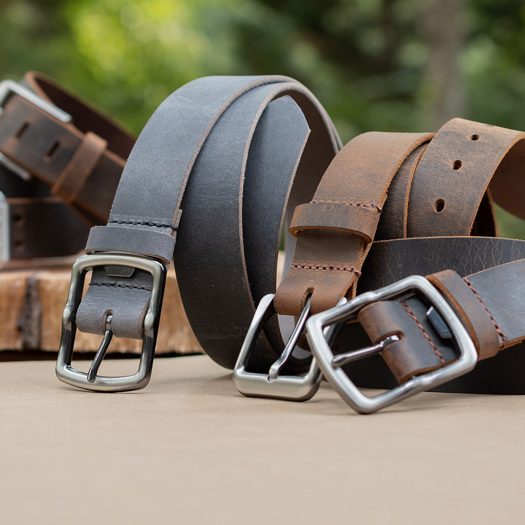 Group of nickel free belts. All have distressed leather and nickel free silver buckles.