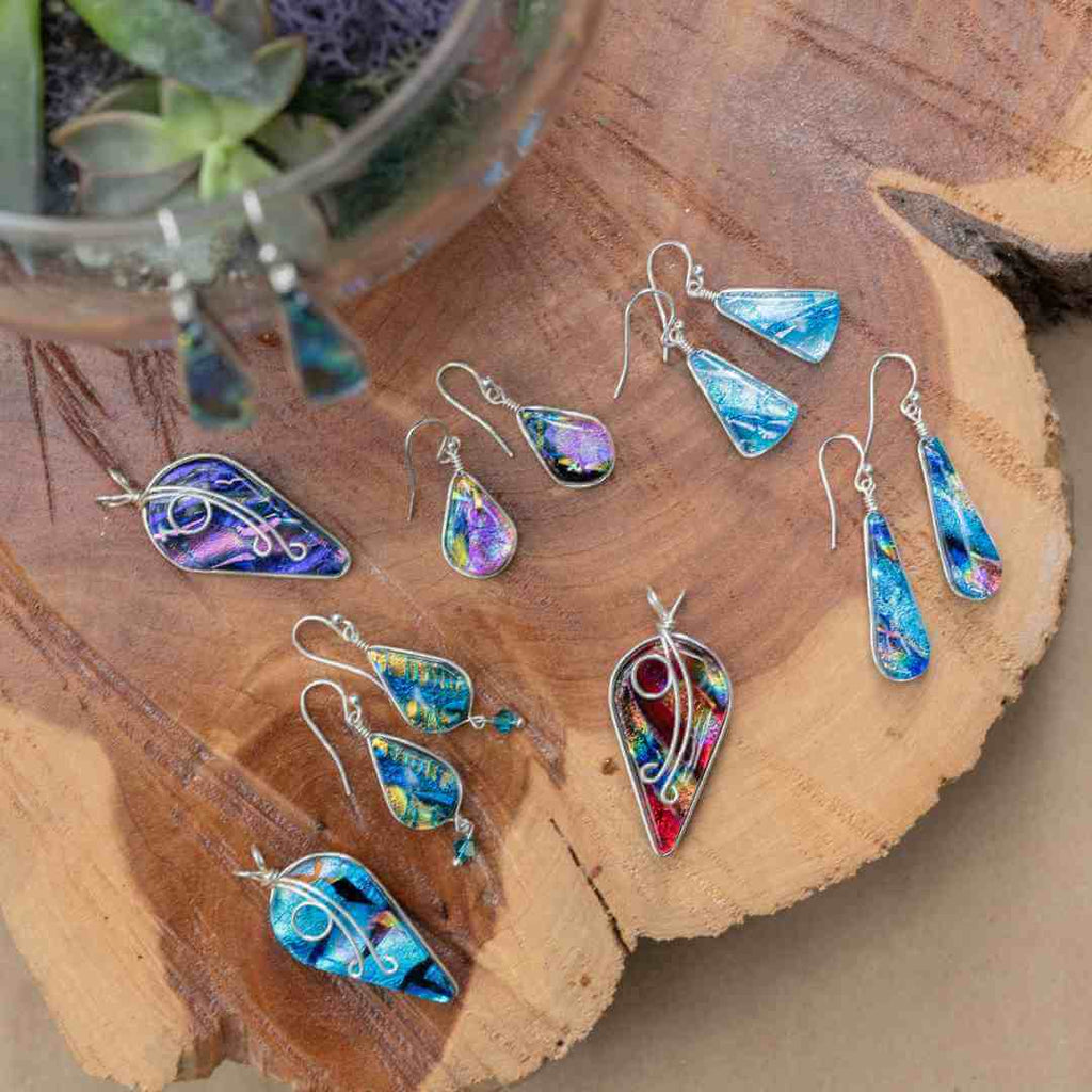 Image of Dichroic glass earrings and pendants.  All nickel free.