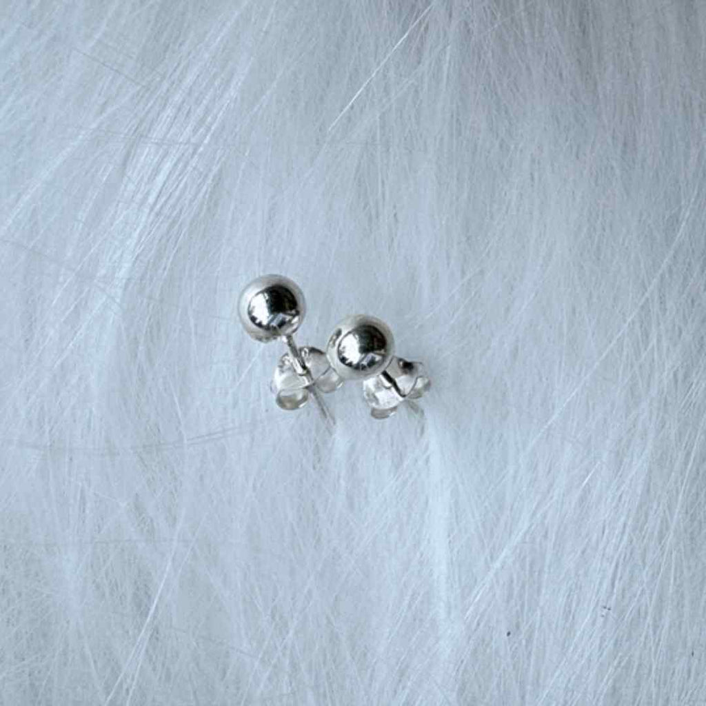 ball earrings made from sterling silver 5-6 mm wide. hypoallergenic and nickel free