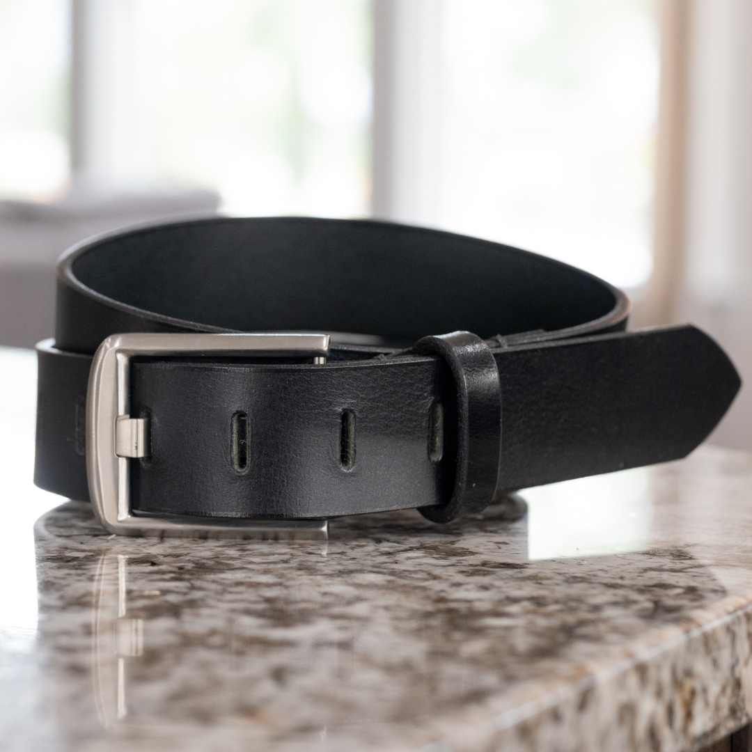 Black leather belt with wide pin and pin holes with silver buckle nickel free