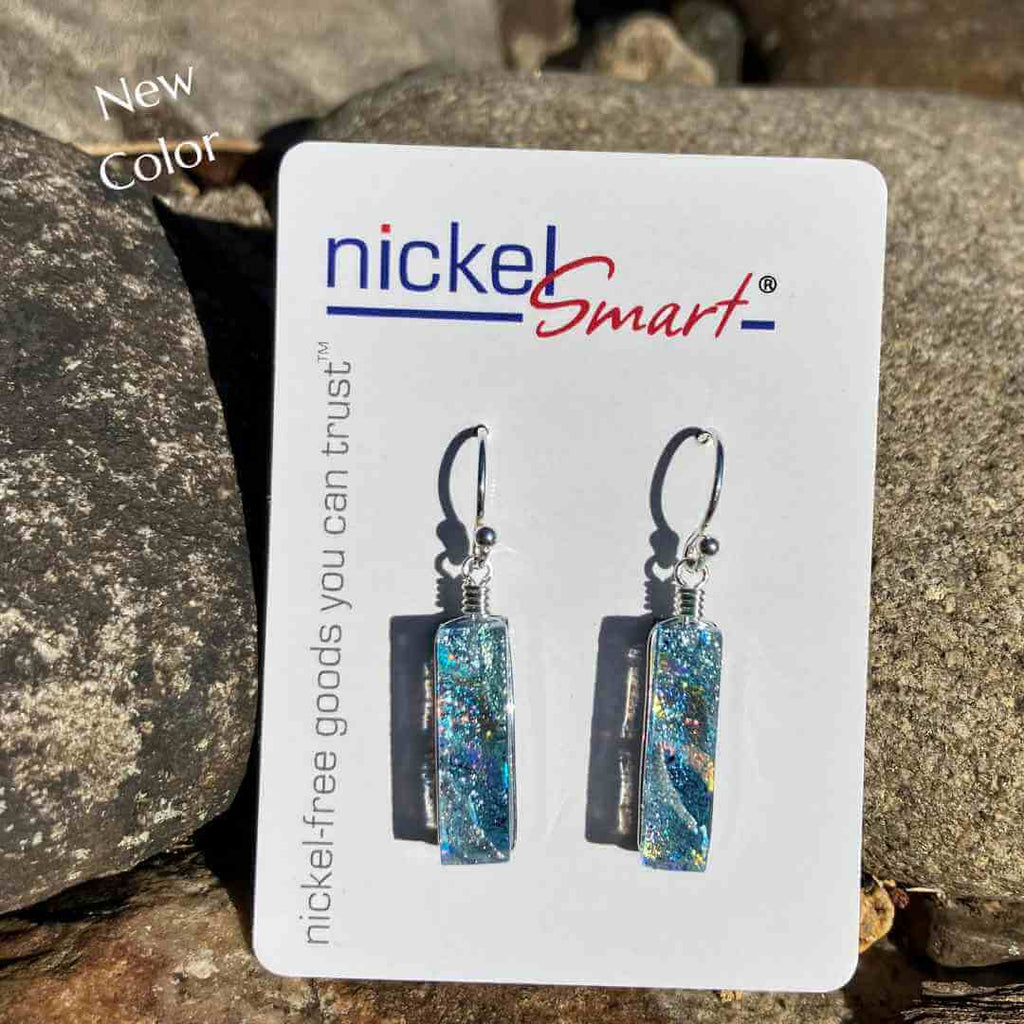 Silver Dichroic Glass earrings. Rectangular, 1 inch drop from silver French hook. Nickel Free