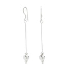 Ballroom Dangle Earrings. Long silver dangles with a couple of artistic silver circles at the end.