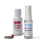 Image of Nickel Alert and Nickel Guard with positive test on swab. (pink color on cotton swab)