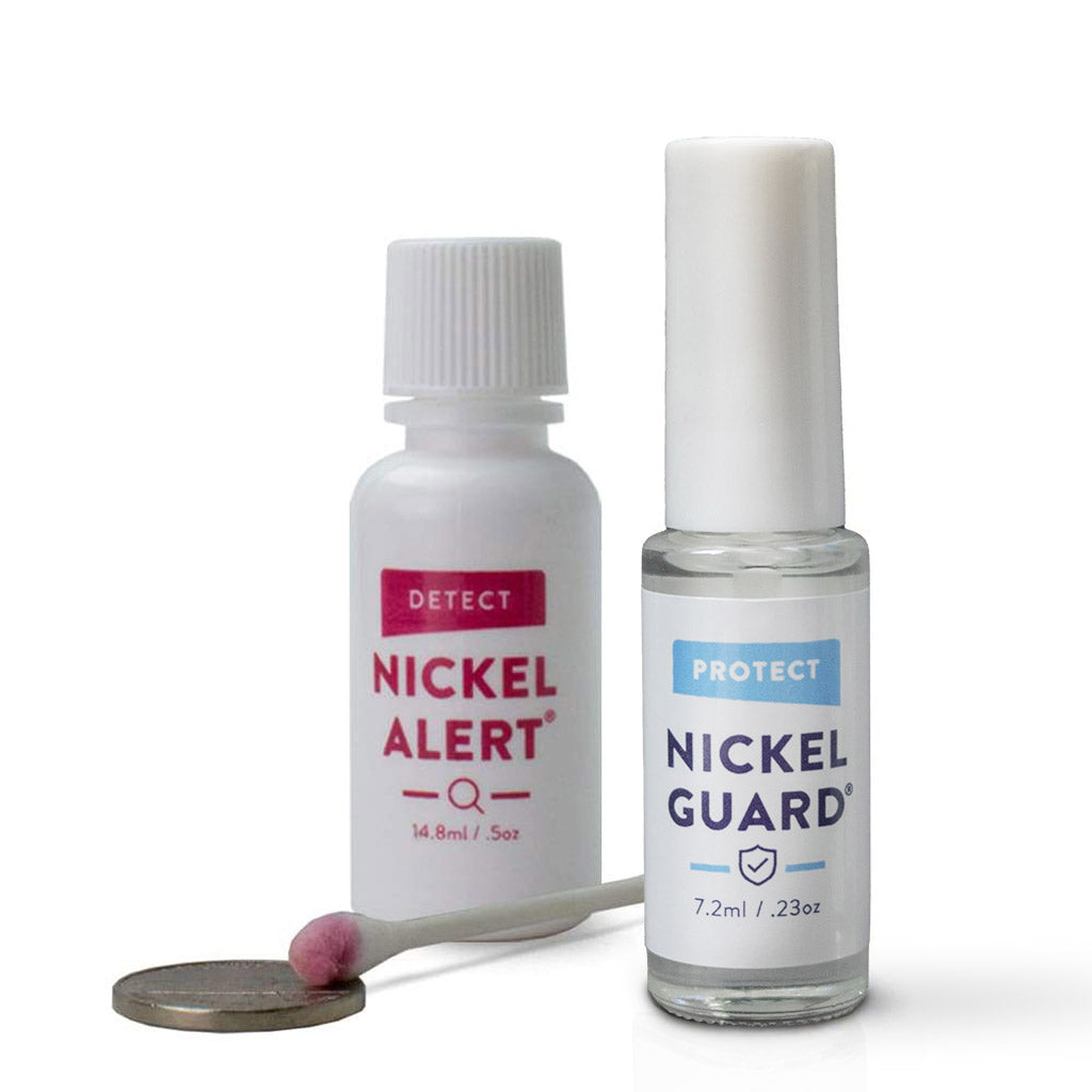 Image of Nickel Alert and Nickel Guard with positive test on swab. (pink color on cotton swab)