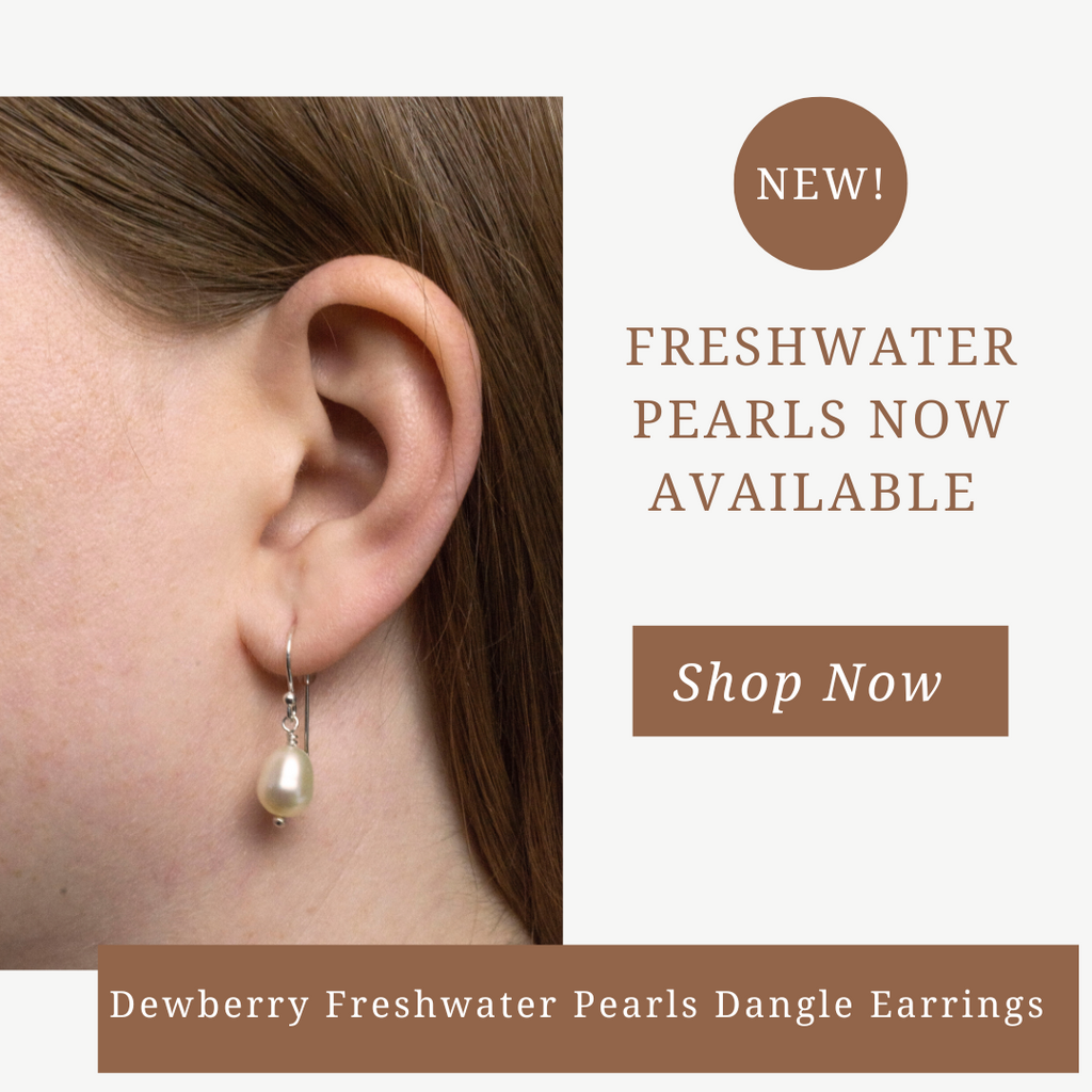 Dewberry Oval Earrings are shown on a model.  Nickel Free French Wire made from sterling silver.