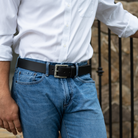 Pathfinder Black Leather Belt on model. Black belt with antiqued silver nickel free buckle.