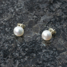 Magnolia Freshwater Pearl Post Earrings. Nickel-free sterling silver butterfly backs.