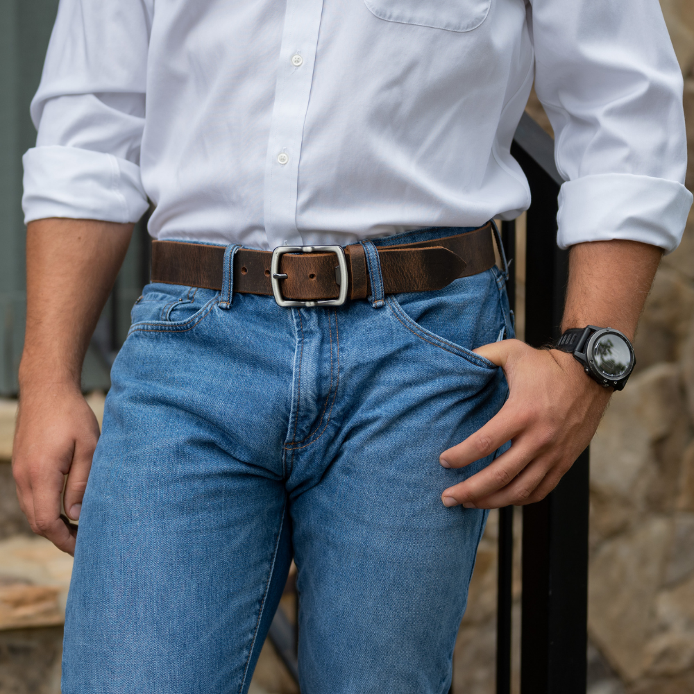 Rocky River Distressed Brown Belt on model. Casual bottle opener buckle and distressed leather.