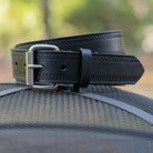 Black Rope Belt. Stainless steel buckle; glossy black strap with embossed design. Roller buckle