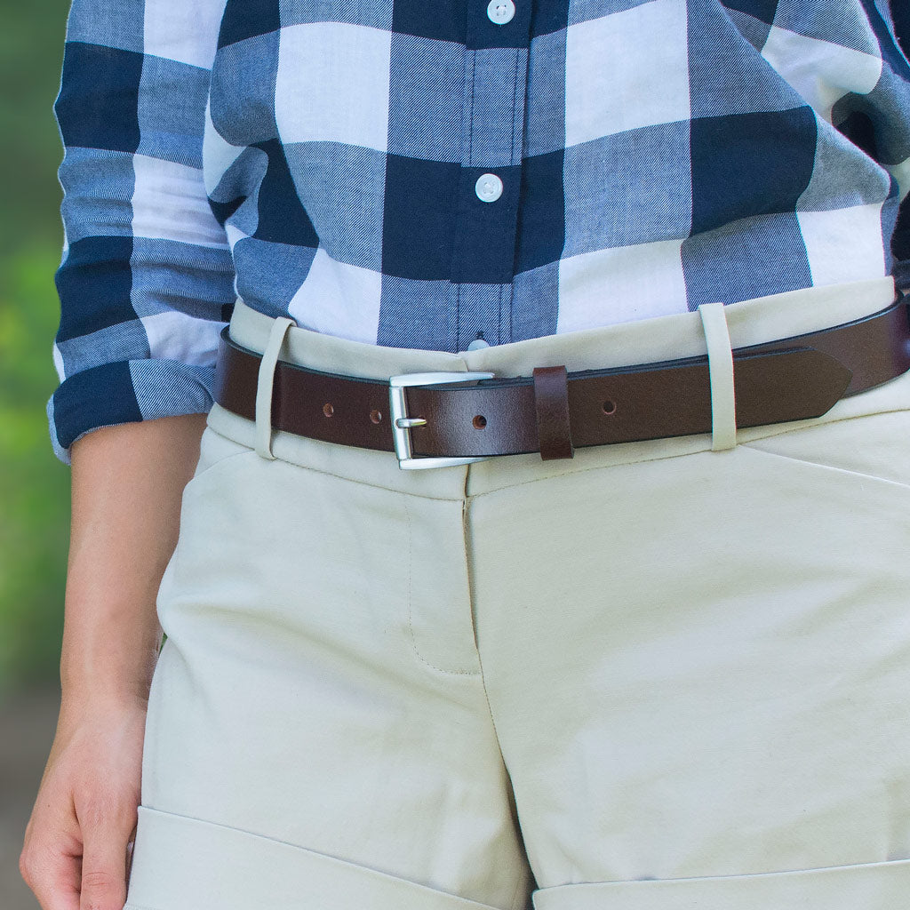 Women's Leather Belt Set. Avery Brown Belt on model in khakis. Flared nickel-free zinc alloy buckle.