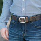 Ridgeline Trail Belt Set - brown belt on model. Casual strap ; ideal for jeans. 1.5 inches wide.