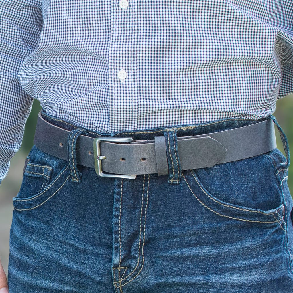 Smoky Mountain Distressed Leather Belt on model. Gray leather belt looks great with jeans.