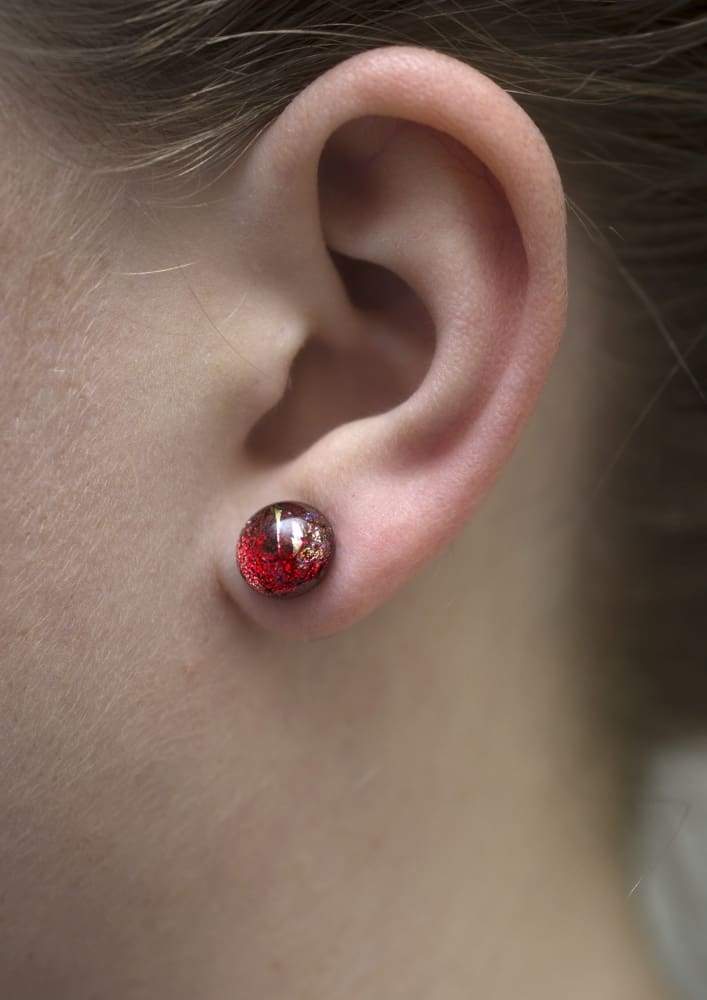 Interstellar Earrings on model. No rash! Small circular earrings are 4-6mm, smaller than earlobe.